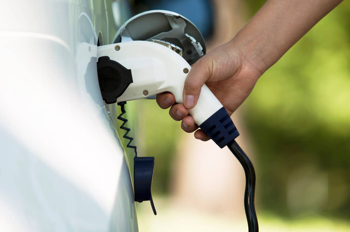 Plugging in an EV (electric vehicle)